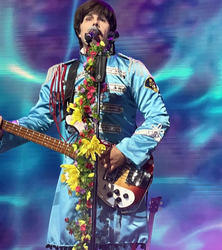 Our Paul in front of the Sgt Pepper imagery